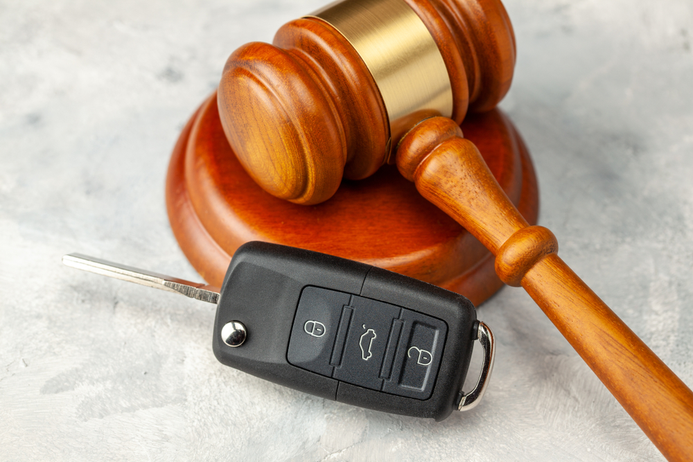 Car,Accident.,Judge,Gavel,And,Car,Bleeding,With,Alarm.,Car