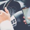 Hand,Using,Phone,Sending,A,Text,While,Driving,To,Work